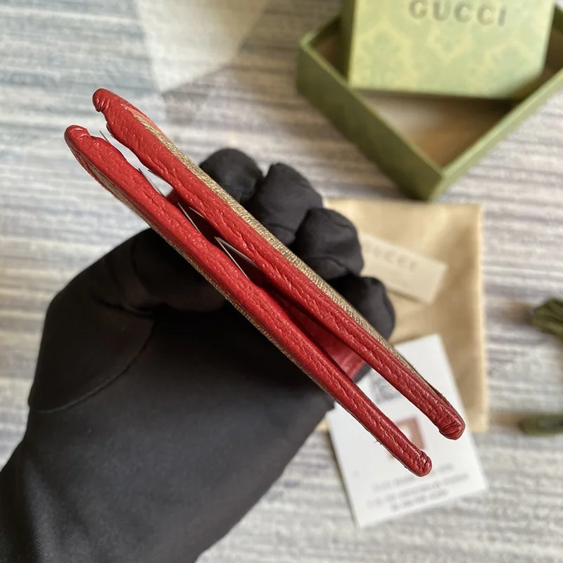 大人気コラボ商品 グッチ ドラえもん コピー 二つ折り財布 牛柄 6544982T3AG 9795